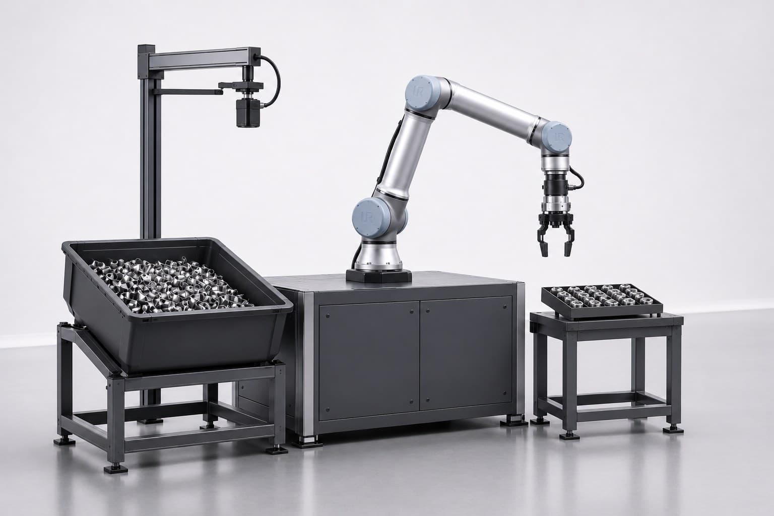 Robotic arm picking parts from a bin of unsorted metal components using an overhead vision system, and placing them into an organized tray